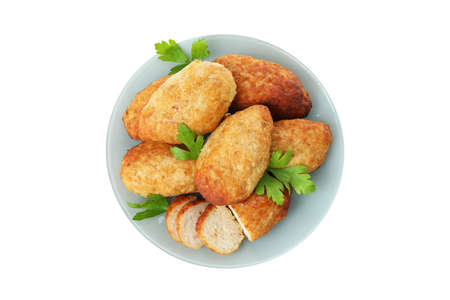 Plate with cutlets isolated on white background