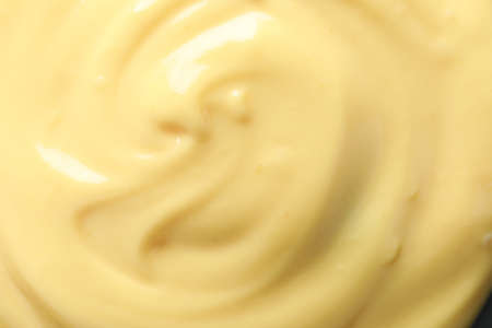 Tasty cheese sauce, top view and close upの写真素材