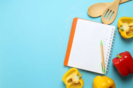 Concept of recipe on blue background, space for textの写真素材