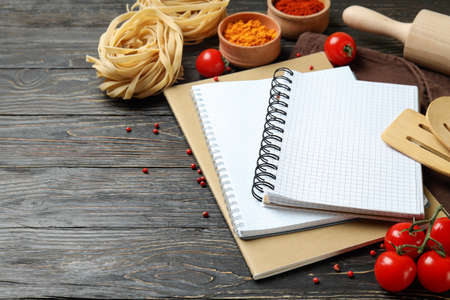 Concept of recipe on wooden background, space for textの写真素材