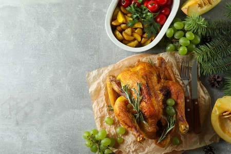 Christmas roast turkey concept on gray textured tableの写真素材