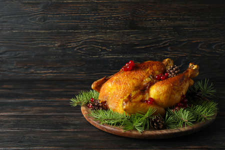 Concept of Christmas roast turkey on wooden tableの写真素材