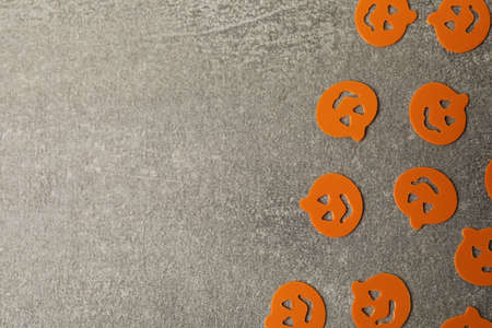 Pumpkins on gray textured background, space for textの写真素材