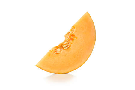 Ripe melon slice isolated on white backgroundの写真素材