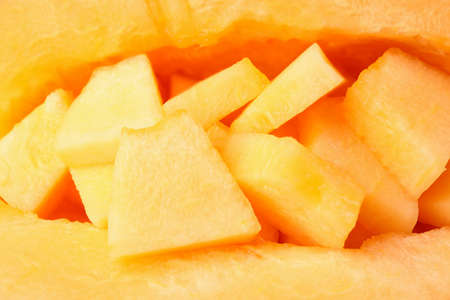 Fresh ripe melon pieces in mellon, close upの写真素材