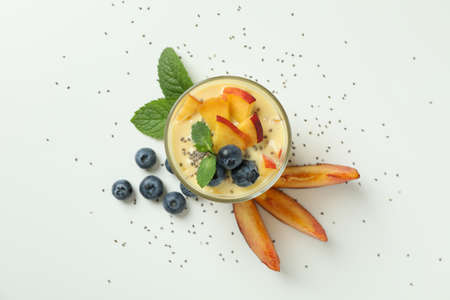 Concept of healthy food with peach yogurt on white backgroundの写真素材