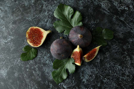 Fig with leaves on black smokey backgroundの写真素材