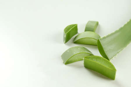 Aloe vera leaf and slices on white backgroundの写真素材