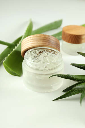 Aloe vera and cosmetics on white backgroundの写真素材