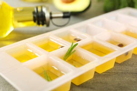 Ice tray with oil, close up and selective focusの写真素材