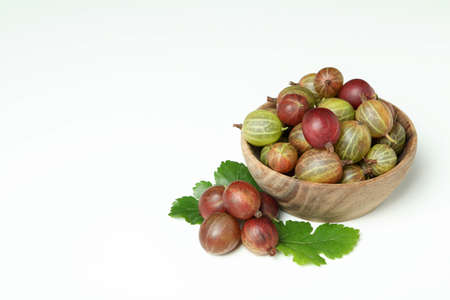 Bowl of ripe gooseberry on white backgroundの写真素材