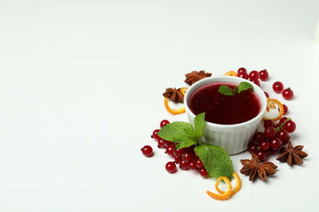Cranberry sauce and ingredients on white backgroundの写真素材