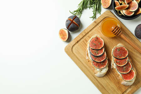 Concept of tasty food with bruschetta with fig on white backgroundの写真素材