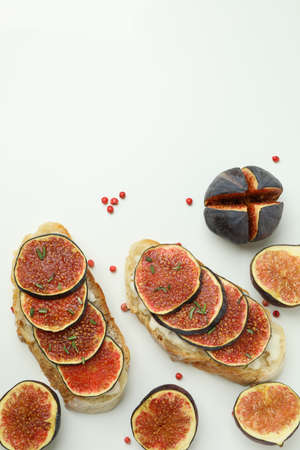 Tasty bruschetta with fig on white backgroundの写真素材