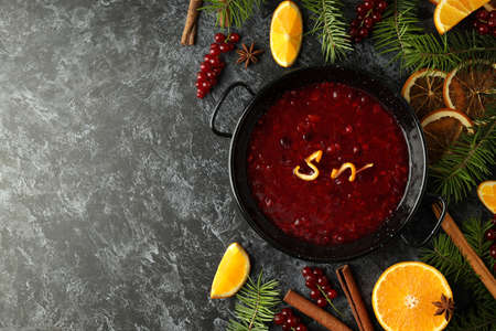 Cranberry sauce and ingredients on black smokey backgroundの写真素材