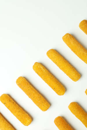 Flat lay with cheese sticks on white backgroundの写真素材