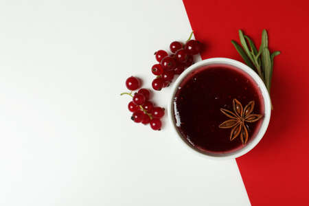 Cranberry sauce and ingredients on two tone backgroundの写真素材