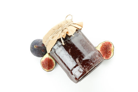 Fig jam and ingredients isolated on white background