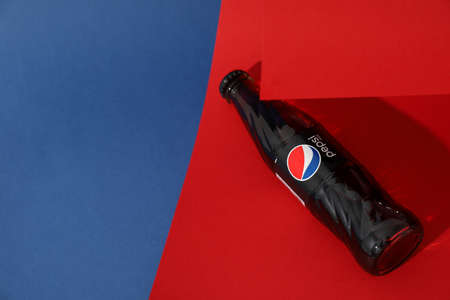 Odessa, Ukraine - September 23, 2021: Pepsi bottle on two tone background.のeditorial素材