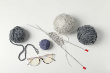 Concept of knitting on white background, top viewの写真素材