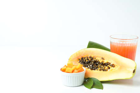Fresh ripe papaya and juice on white backgroundの写真素材