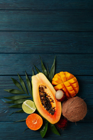 Fresh ripe exotic fruits on wooden background.の写真素材