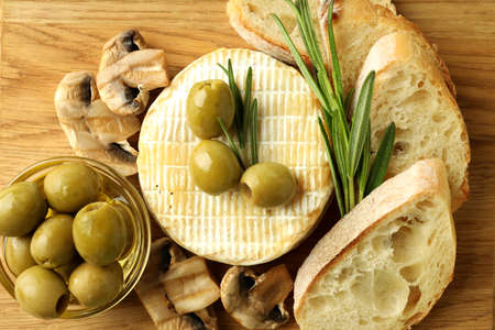 Concept of tasty food with grilled camembert, close up.の写真素材