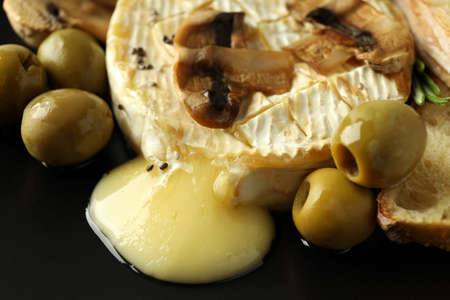 Concept of tasty food with grilled camembert, close up.の写真素材