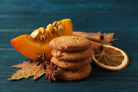 Pumpkin cookies on blue wooden background, close up.の写真素材