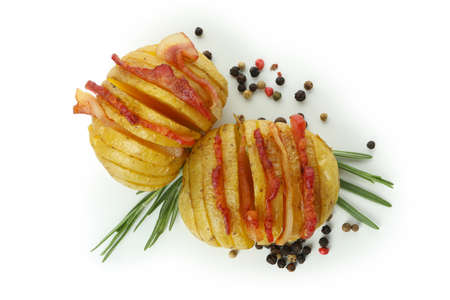 Baked potato with bacon isolated on white background.の写真素材