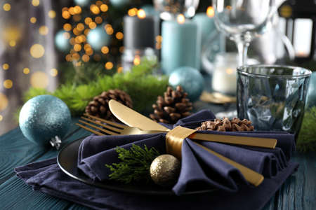 New Year table setting with bokeh on wooden table.の写真素材