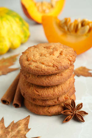 Pumpkin cookies on white textured background, close up.の写真素材