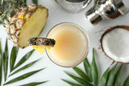Pina colada cocktail and ingredients on white background.の写真素材