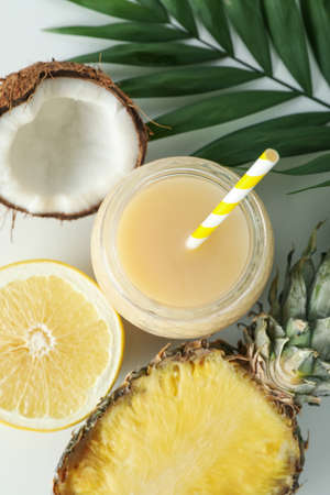 Pina colada cocktail and ingredients on white background.の写真素材