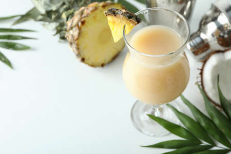 Pina colada cocktail and ingredients on white background.の写真素材