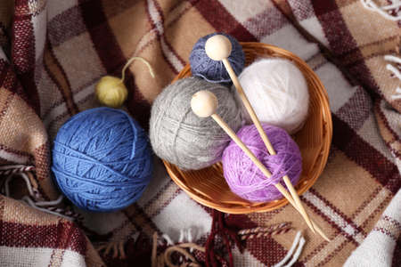 Concept of knitting on checkered plaid background.の写真素材