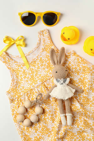 Concept of female baby clothes on light gray background.の写真素材