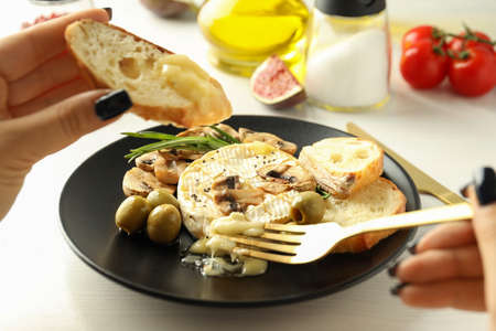 Concept of tasty food with grilled camembert, close up.の写真素材