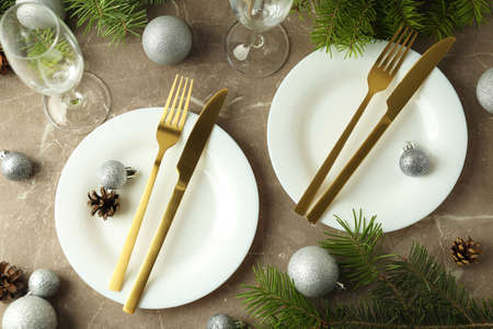New Year table setting on gray textured background.の写真素材