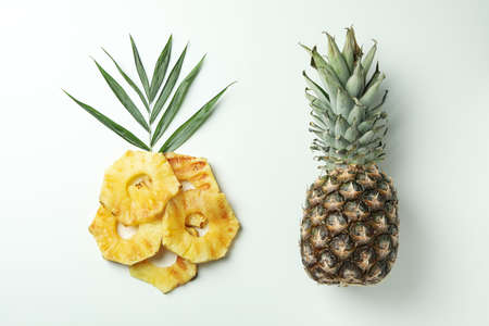 Pineapple and grilled slices on white background.の写真素材