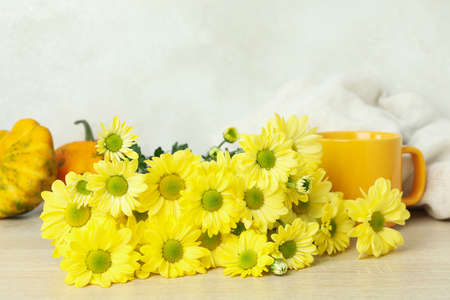 Autumn composition with chrysanthemums on wooden table.の写真素材