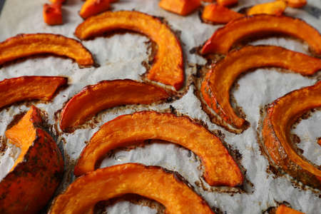 Baking paper with baked pumpkin, close up.の写真素材