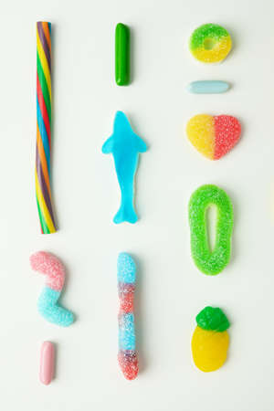 Gummy candies on white background, top view.の写真素材
