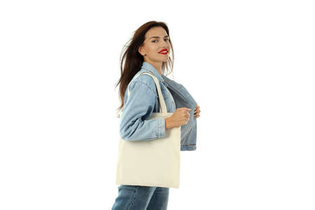 Attractive girl with cotton bag isolated on white background.の写真素材