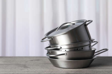 Kitchen utensil on gray textured table, selective focus.の写真素材