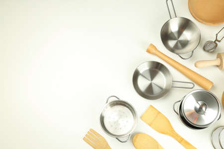 Different kitchen utensil on white background, top view.の写真素材