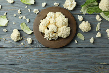 Concept of tasty food with cauliflower on wooden backgroundの写真素材