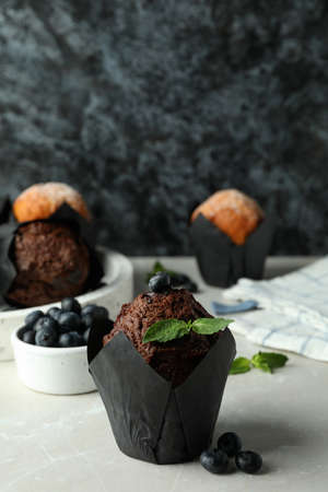 Concept of delicious food with chocolate muffins.
