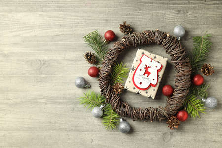 Christmas accessories on wooden background, space for text.の写真素材