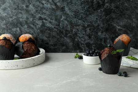 Concept of delicious food with chocolate muffins, space for text.の写真素材